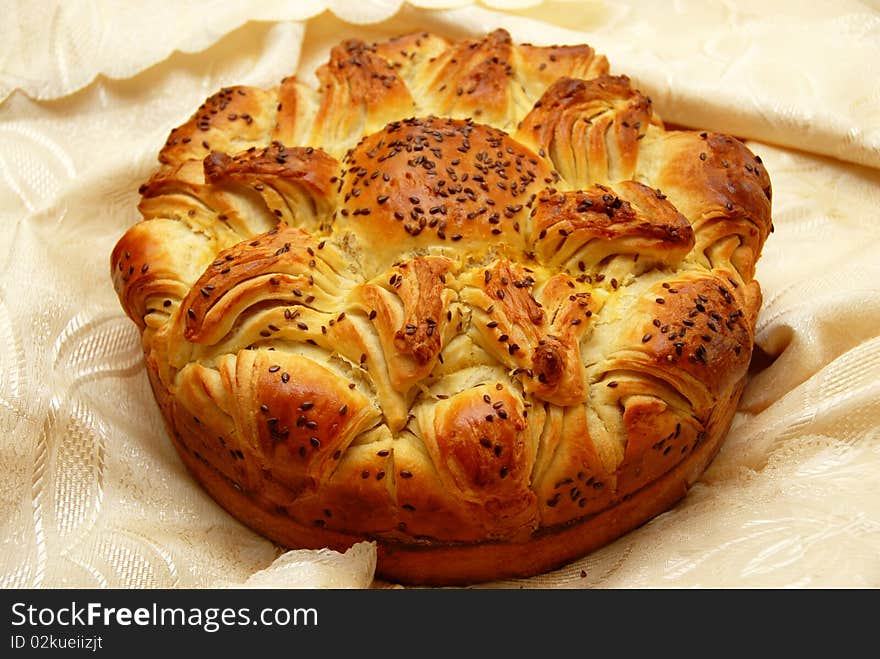 Appetizing fresh homemade decorative bread with flax seeds