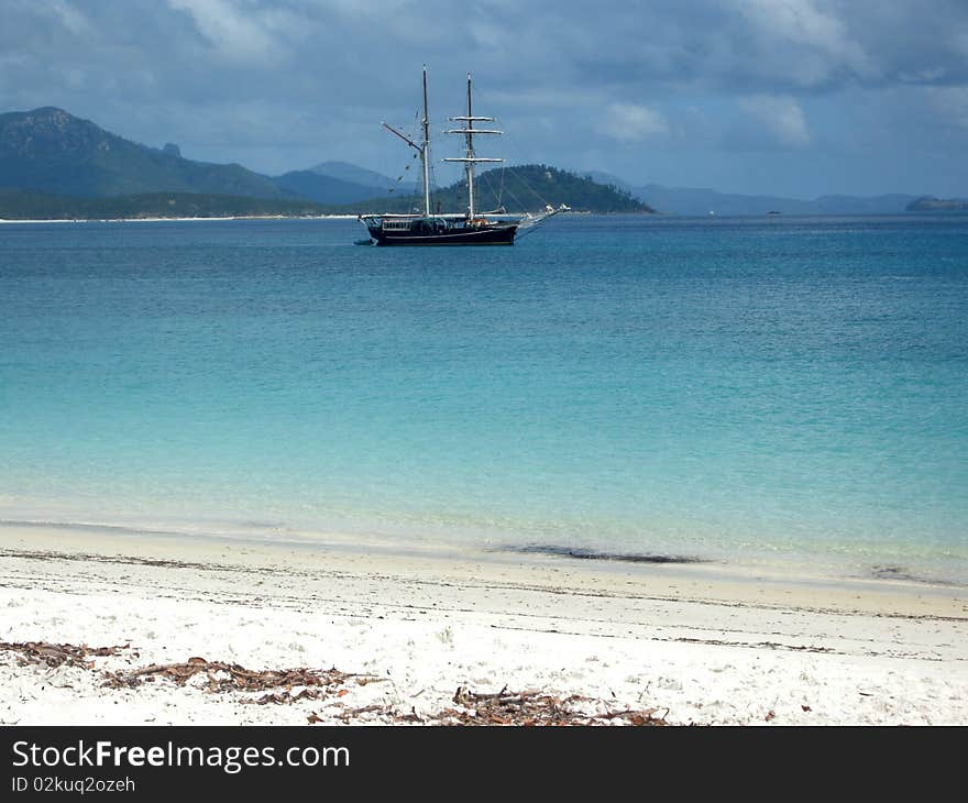 Schooner anchored in a beautiful bay in Australia inside the Great Barrier Reef. Schooner anchored in a beautiful bay in Australia inside the Great Barrier Reef.