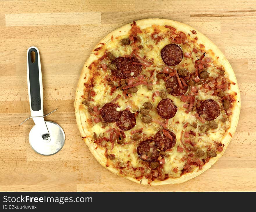 Freshly cooked takeaway pizza on a kitchen bench. Freshly cooked takeaway pizza on a kitchen bench