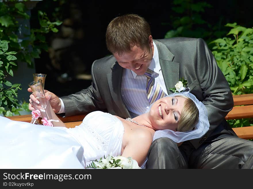 The groom and the bride in outdoors. The groom and the bride in outdoors