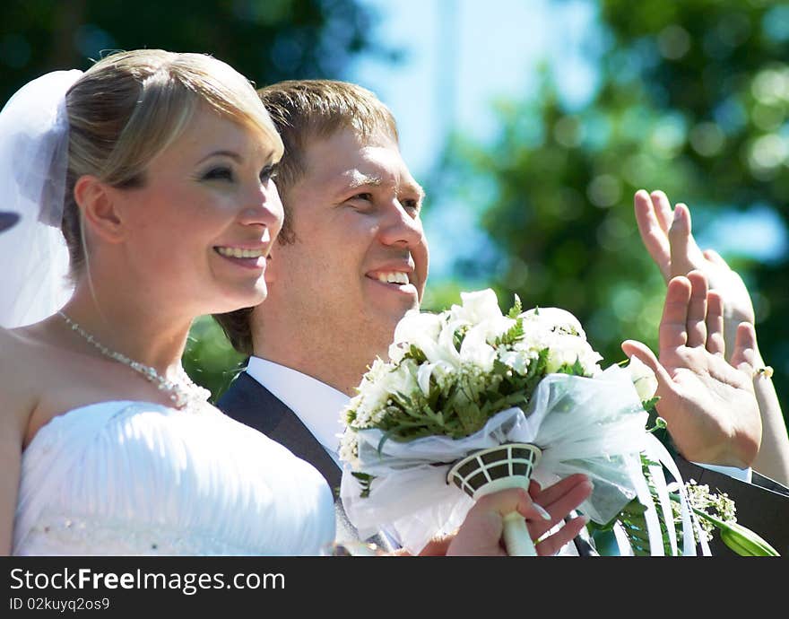 The groom and the bride in outdoors. The groom and the bride in outdoors