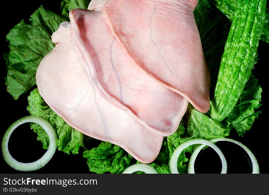 Three pig's ear, and lettuce and balsam pear, and Onions. Three pig's ear, and lettuce and balsam pear, and Onions.