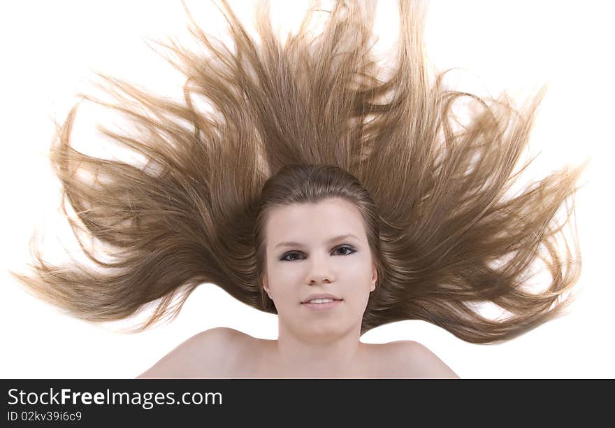 Portrait of pretty young blondie with beauty hairs lying on the floor. Portrait of pretty young blondie with beauty hairs lying on the floor