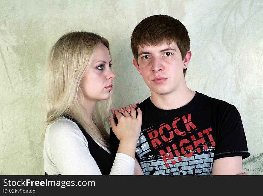 Portrait of man and woman on a vintage background. Portrait of man and woman on a vintage background