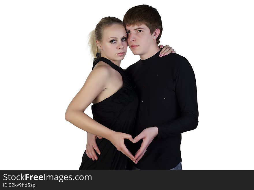 Boy and girl posing on a white background. Boy and girl posing on a white background