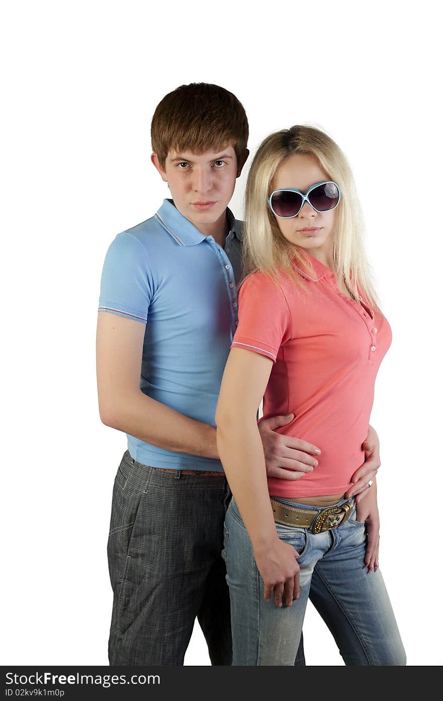 Girl and boy posing on a white background. Girl and boy posing on a white background