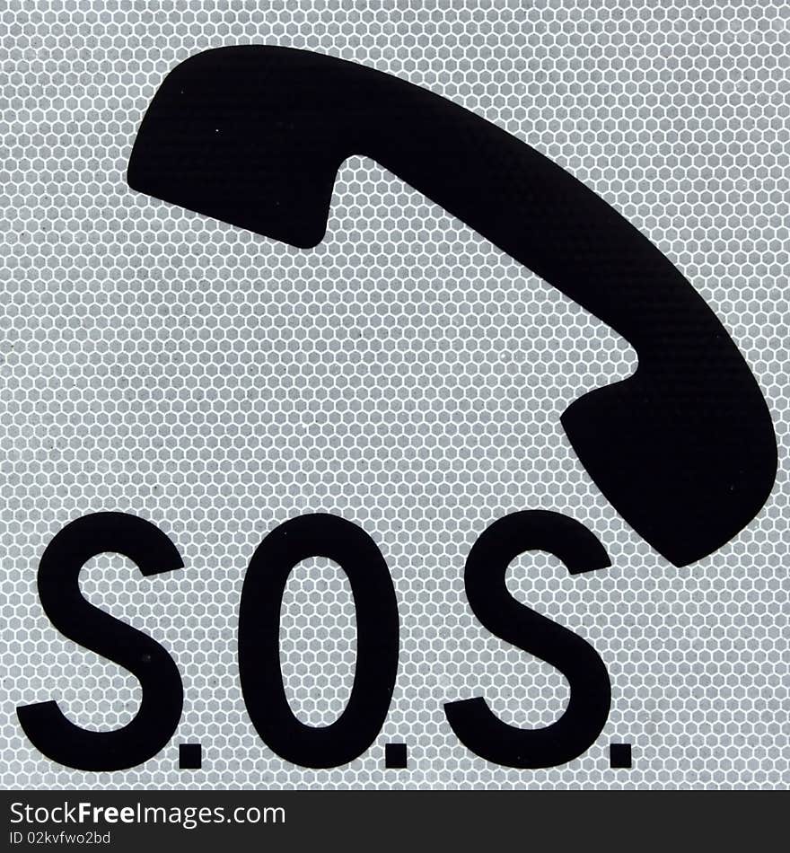 Symbol of a phone and word SOS on a white background. Symbol of a phone and word SOS on a white background