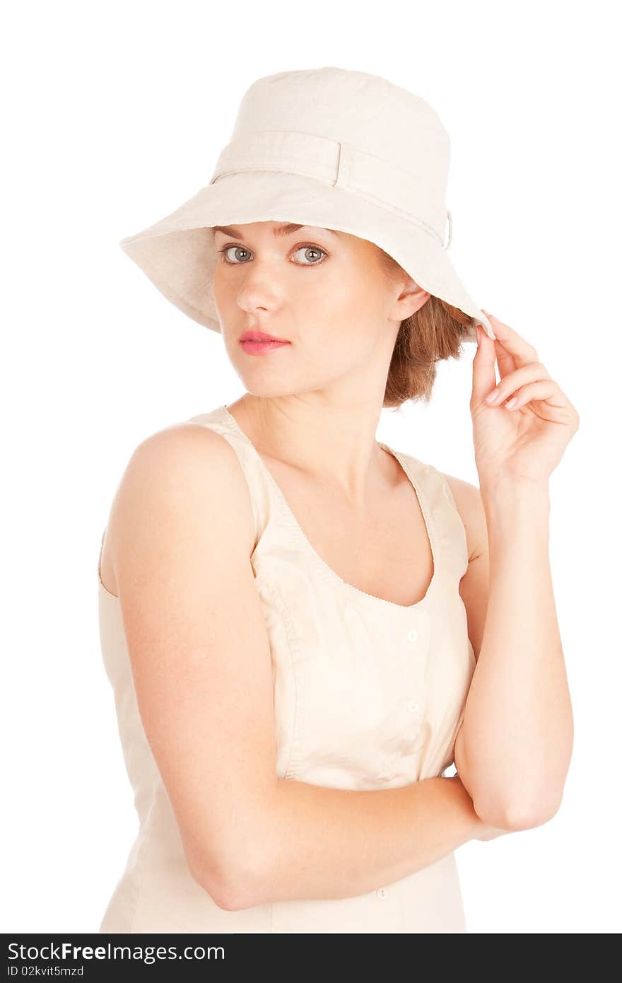 Young woman in hat isolated on white