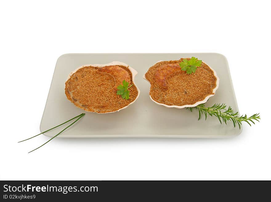 Two scallop on a white plate