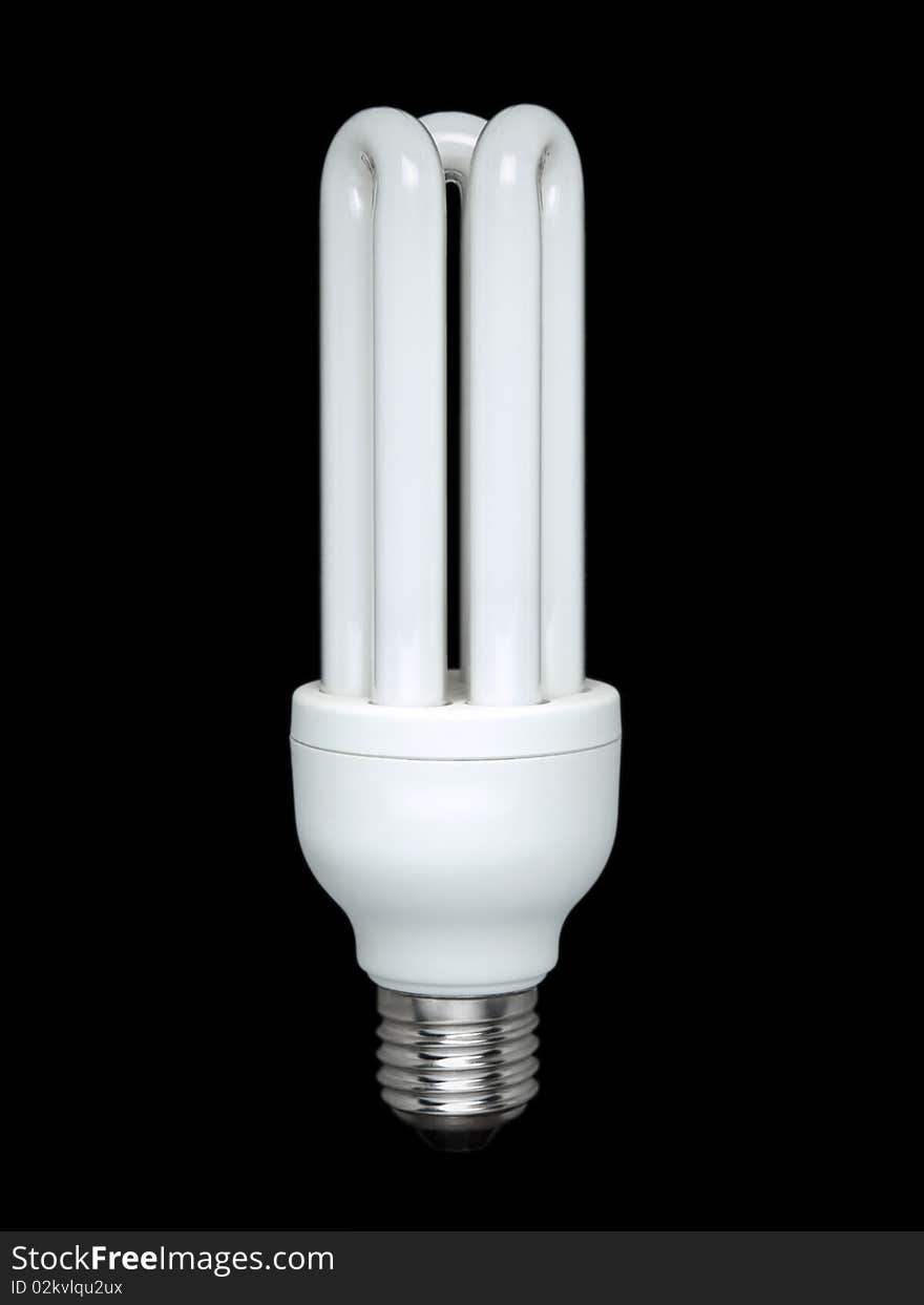 Compact fluorescent light bulb over a black background. Compact fluorescent light bulb over a black background.