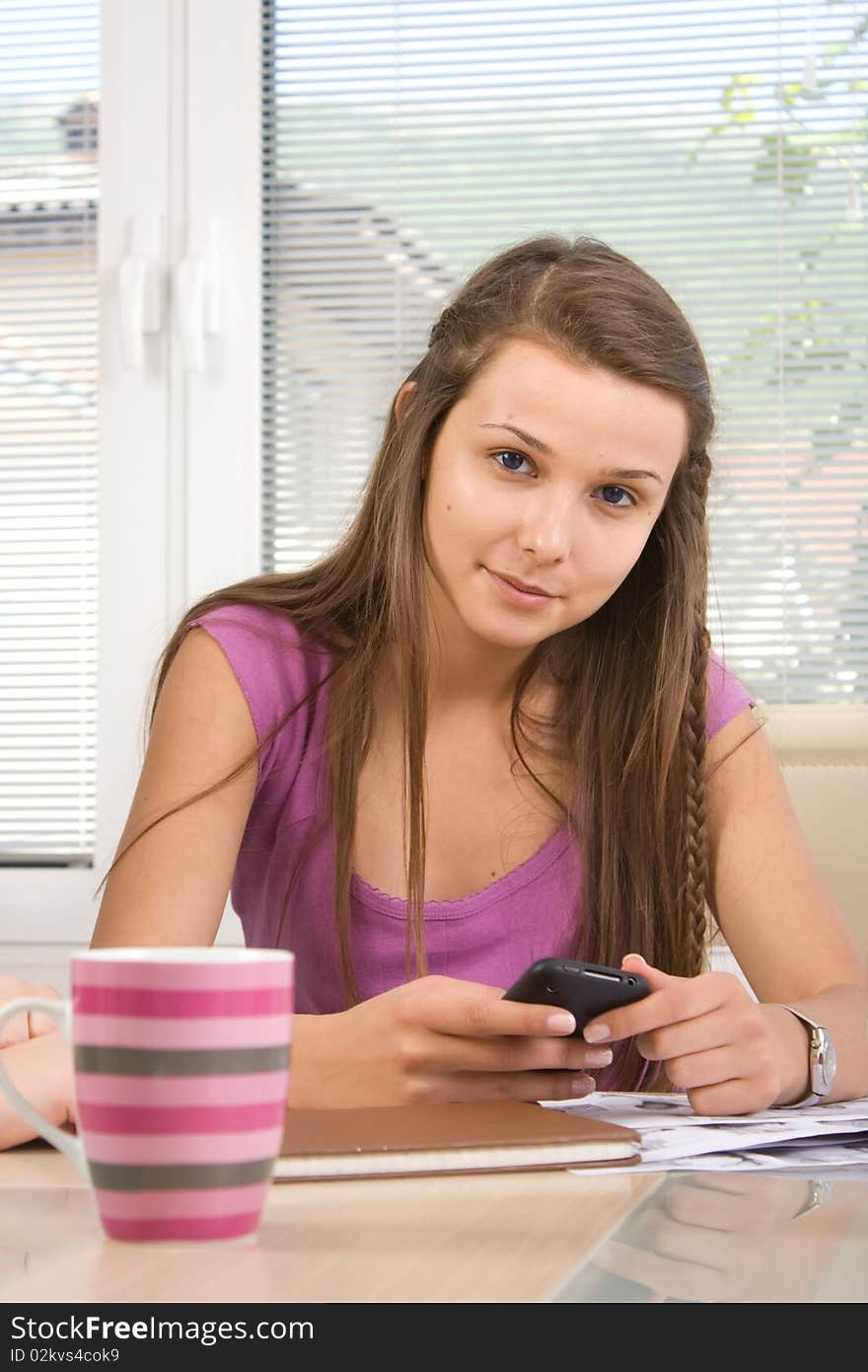 Attractive young girl with mobile phone