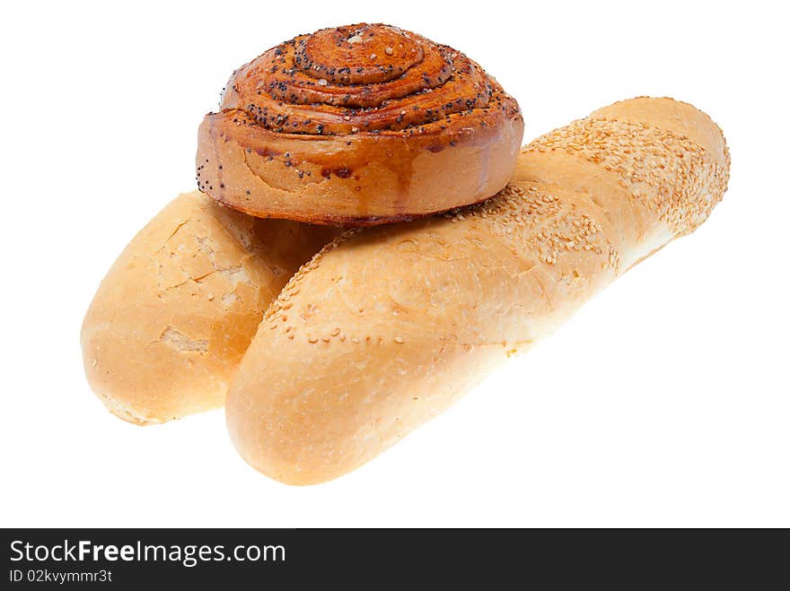 Long loafs of the French bread on a white background