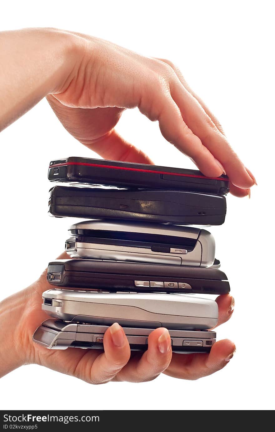 Sandwich from mobile phones in woman's hands. Sandwich from mobile phones in woman's hands