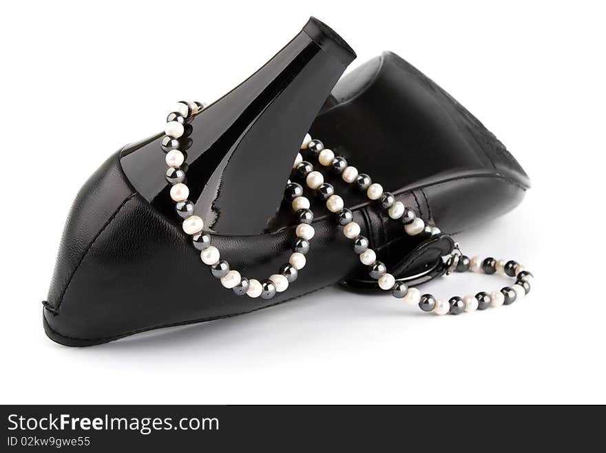 White pearls and black stone beads on High Heels Shoe. White pearls and black stone beads on High Heels Shoe