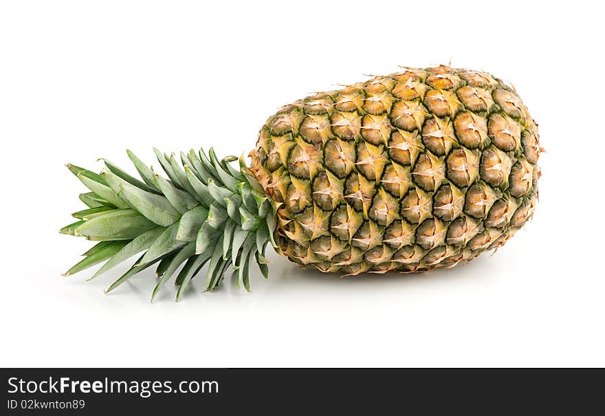 Ripe pineapple isolated on a white background