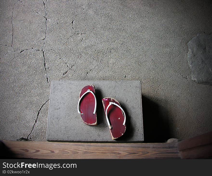 Old japanese clogs, at the entrance of an apartament