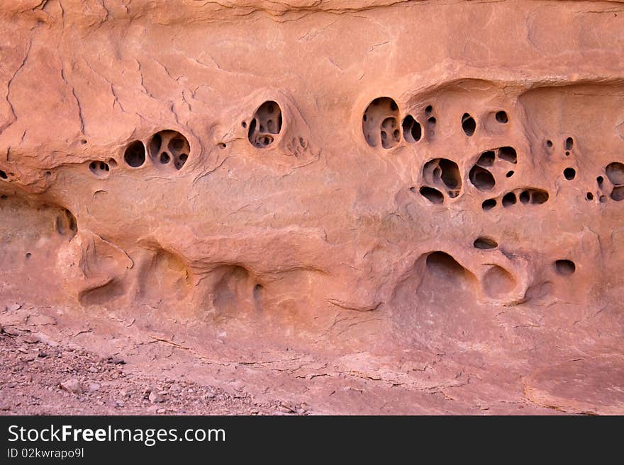 Strange Holes In Red Sandstone