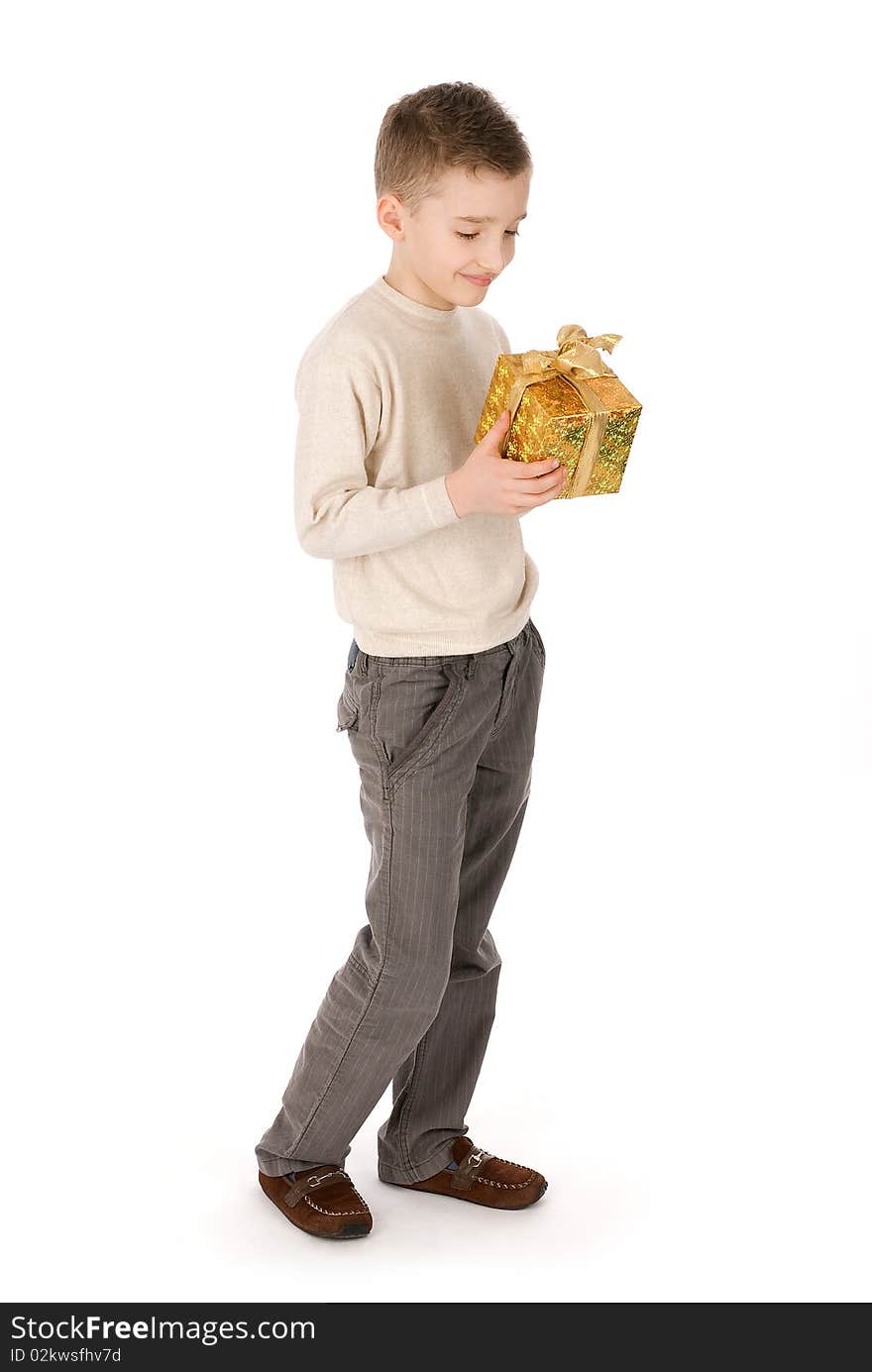 Child with a gift box isolated over white