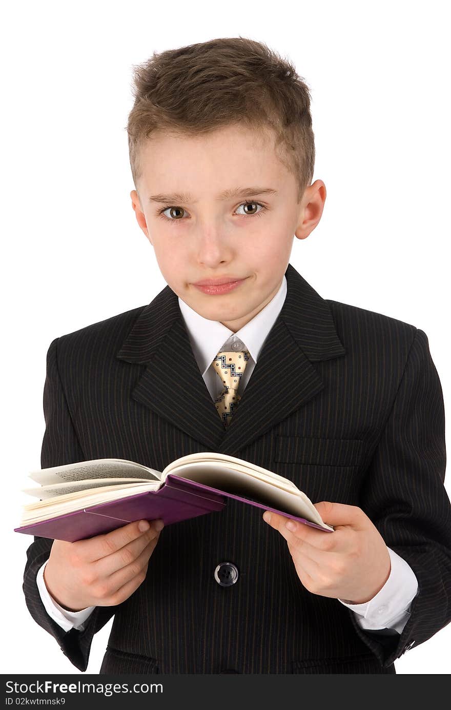 Adorable boy with a book isolated on a white