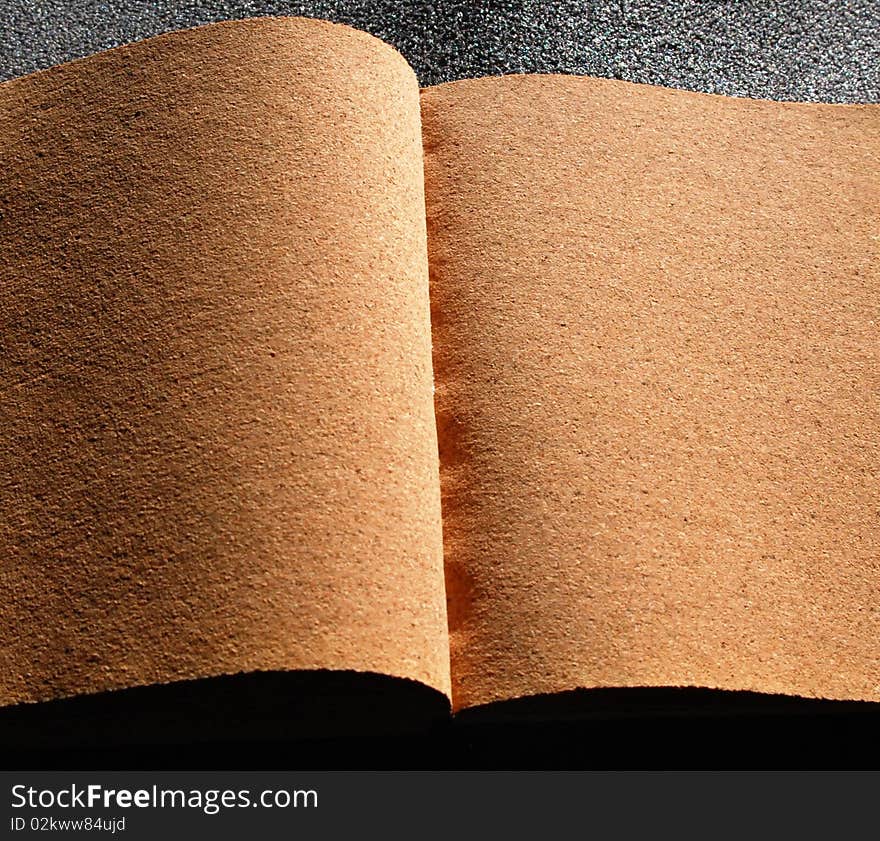 A writable book made of cork. A writable book made of cork