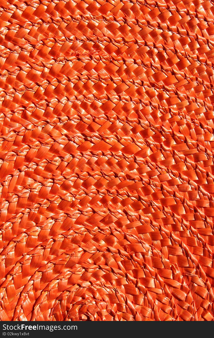 The orange arches, straw helix, orange network, large circles, abstract background, unique original texture, natural materials, the history of naive culture, retro handmade technology, the ancient art of weaving, the art of weaving with straw