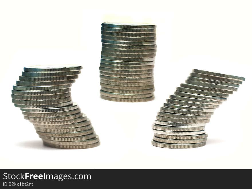 3 stacks of coins in difference stack shape