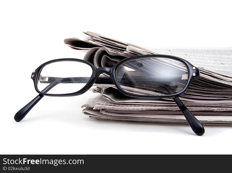 Newspaper And Glasses