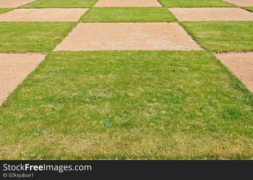 Square pattern a green grass