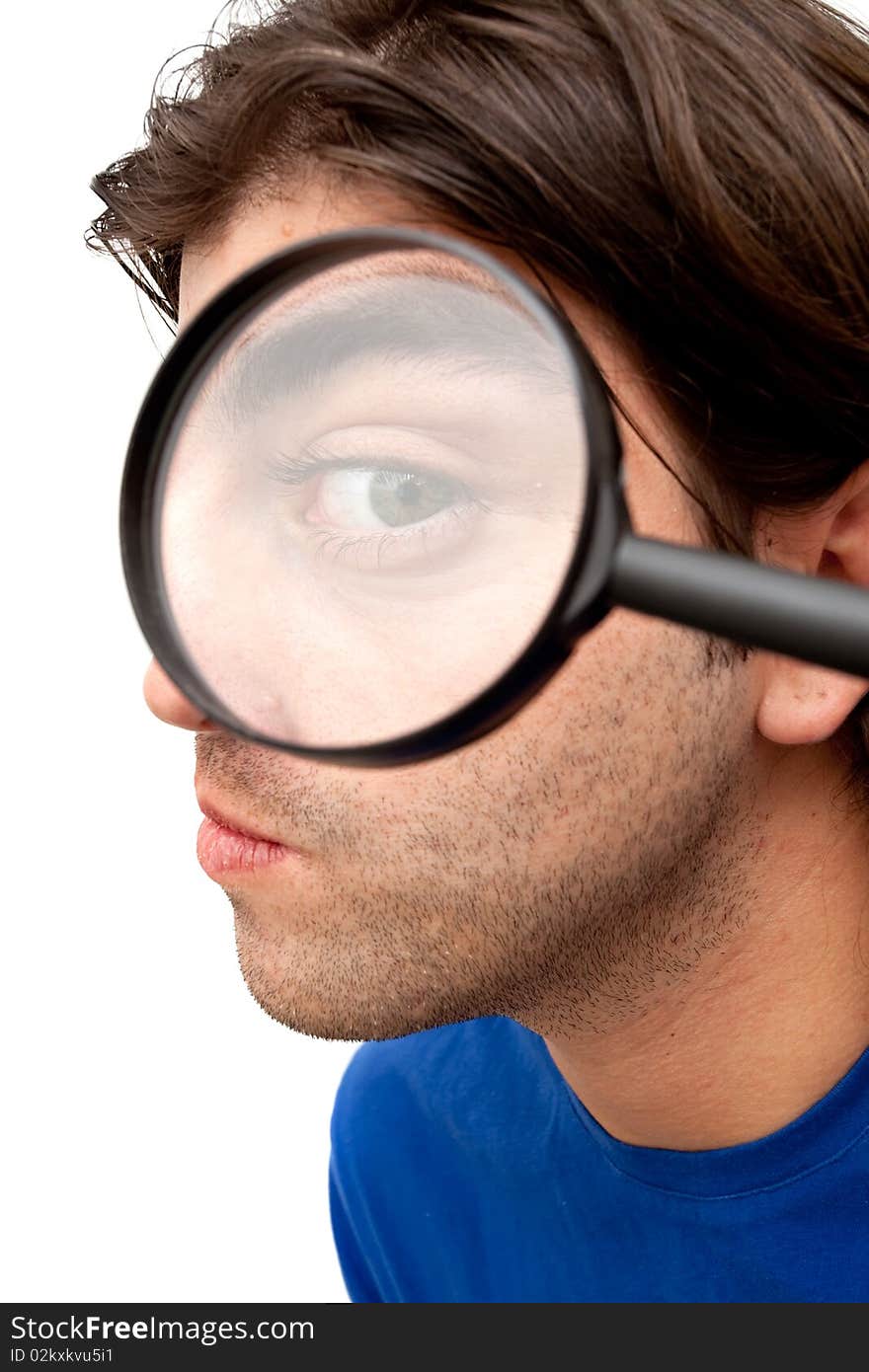 Curious man holding a magnifying glass