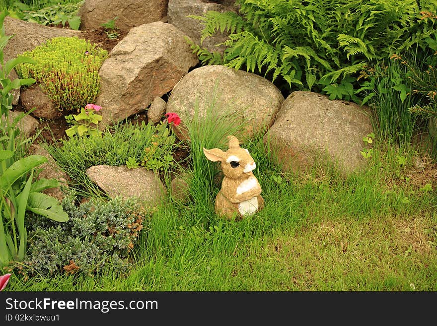 Garden composition from grass and stones