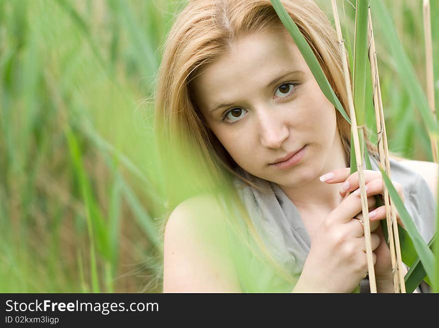 Beautiful teen blond girl at the meadow. Beautiful teen blond girl at the meadow