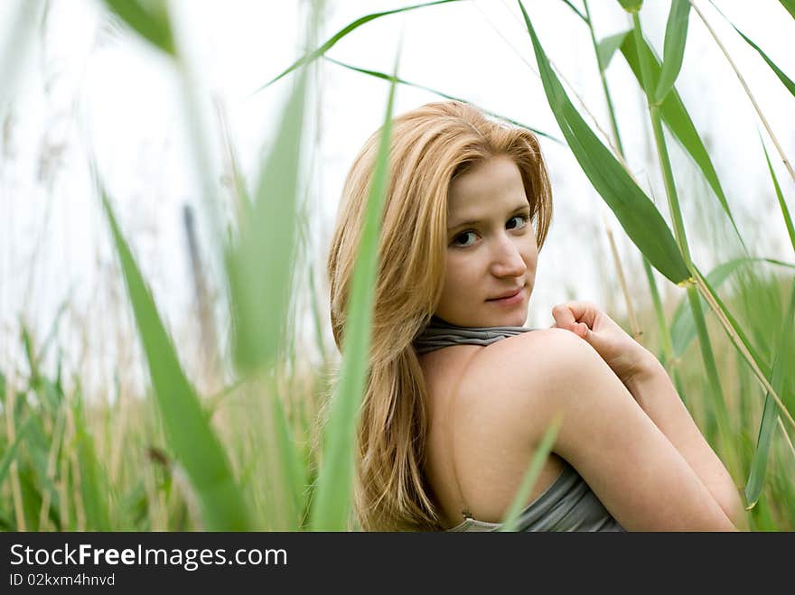 Beautiful teen blond girl at the meadow. Beautiful teen blond girl at the meadow