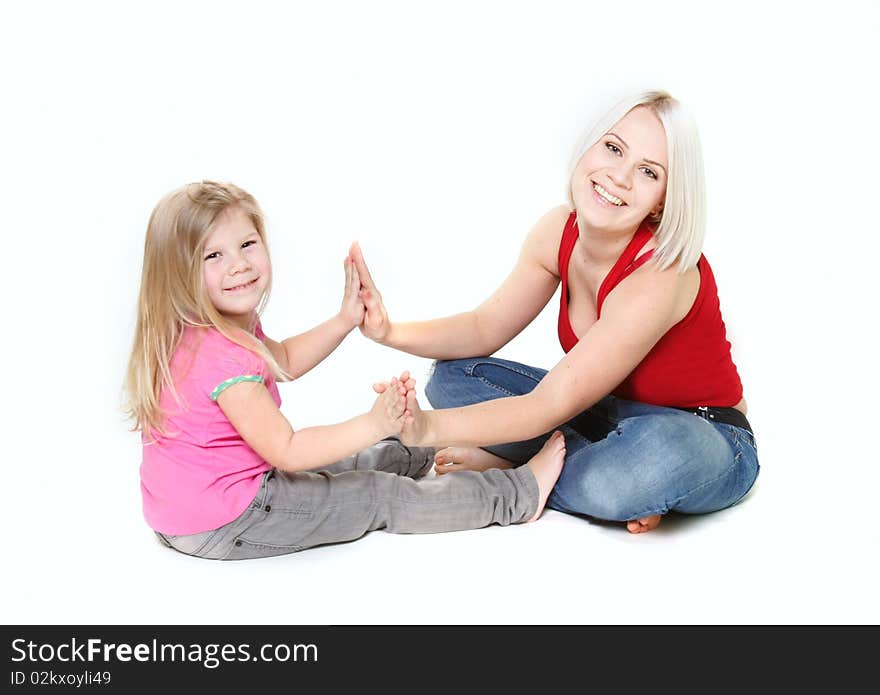 Happy mother and daughter playing