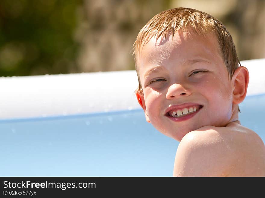 Portrait of a young child in a swimming pool