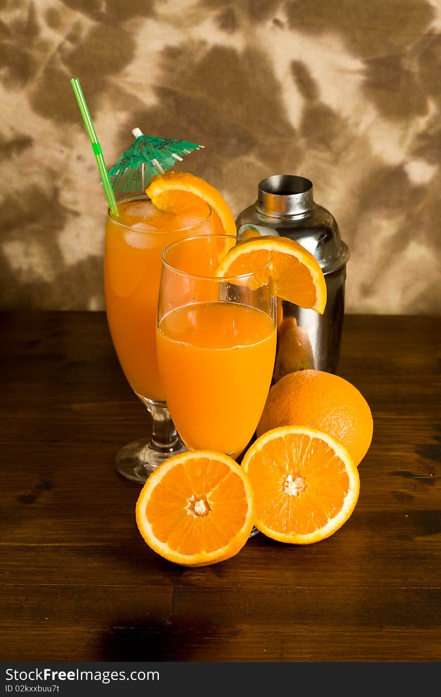 Photo of Orange cocktail on wood table