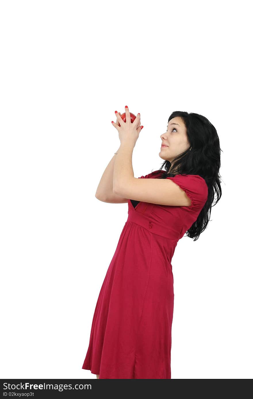 Young girl with apple isolated on white