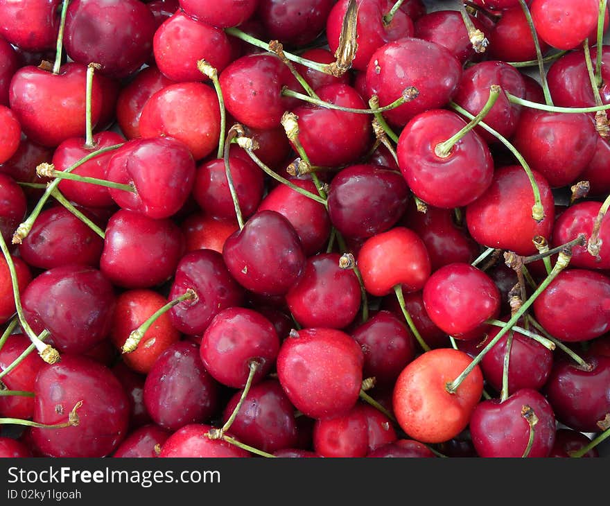 Background of Juicy ripe cherries. Background of Juicy ripe cherries