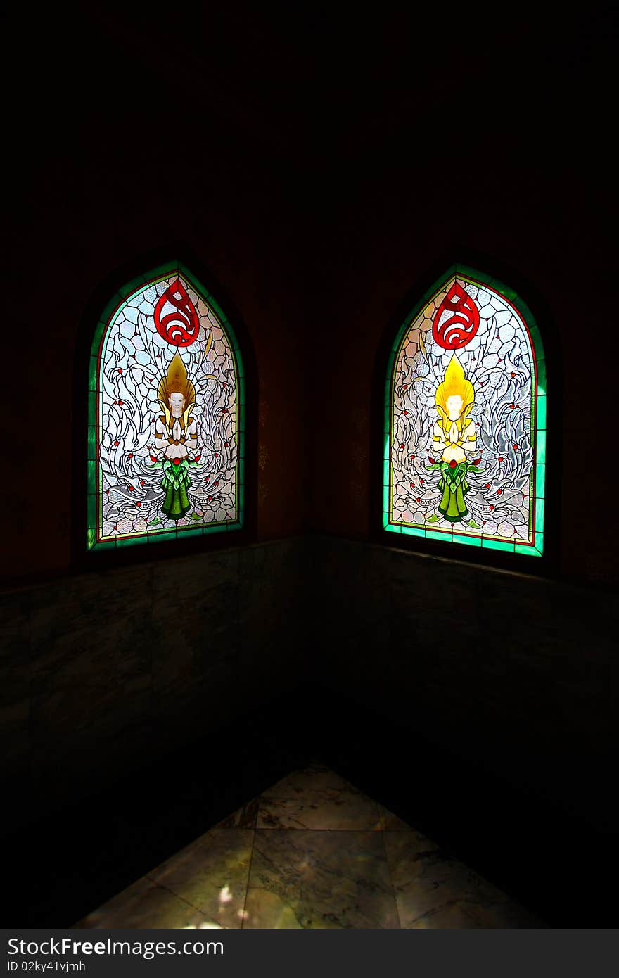 Colorful glass window with Thai art at Mae Slaong sacred sanctuary. Colorful glass window with Thai art at Mae Slaong sacred sanctuary