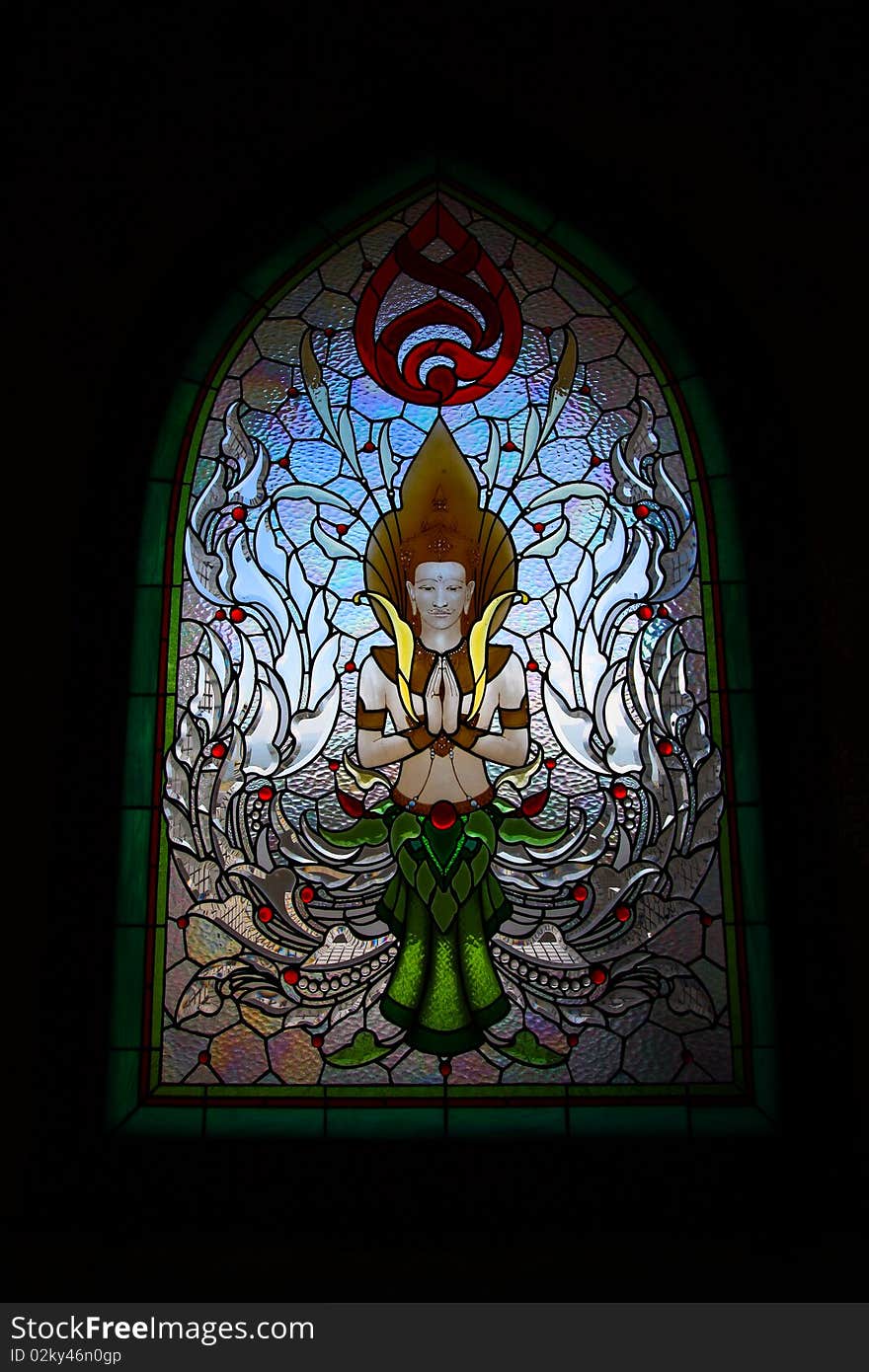 Colorful glass window with Thai art at Mae Slaong sacred sanctuary. Colorful glass window with Thai art at Mae Slaong sacred sanctuary