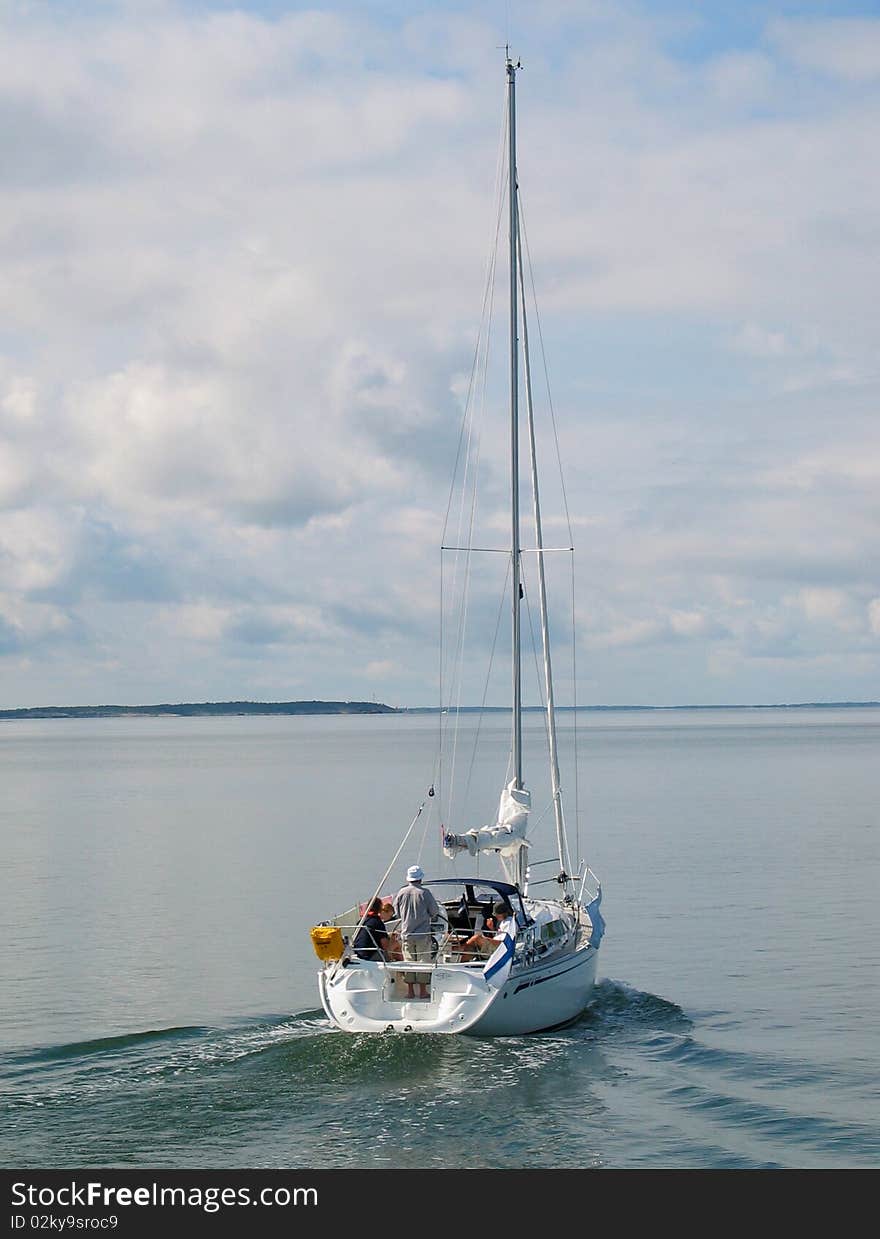 Picture of a sailboat advancing without any wind. Picture of a sailboat advancing without any wind