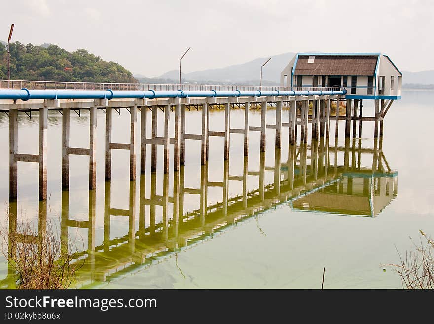 A water pump station with a mirror with water view,Chonburi Thailand. A water pump station with a mirror with water view,Chonburi Thailand