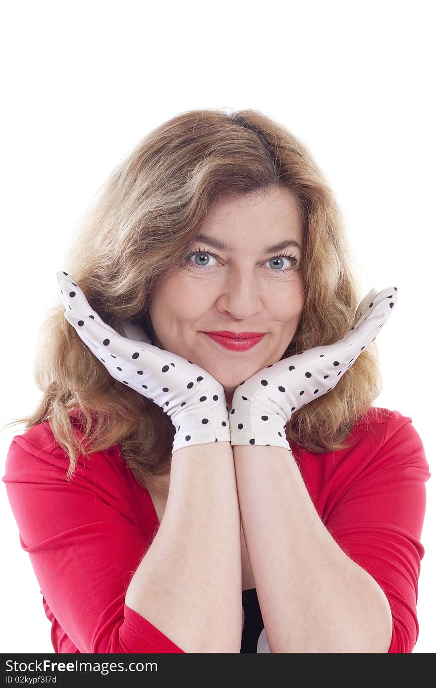 Portrait of a middle-aged woman in red with polka-dot gloves - isolated on white. Portrait of a middle-aged woman in red with polka-dot gloves - isolated on white