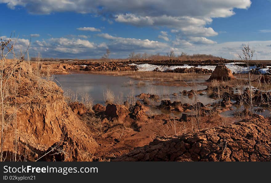 Spring light, melted water and last snow in Russia