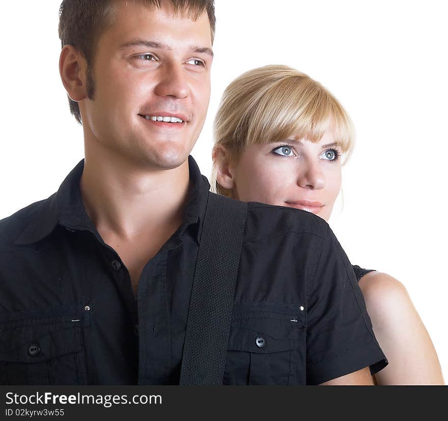 Happy young pair pose on a white background. Happy young pair pose on a white background