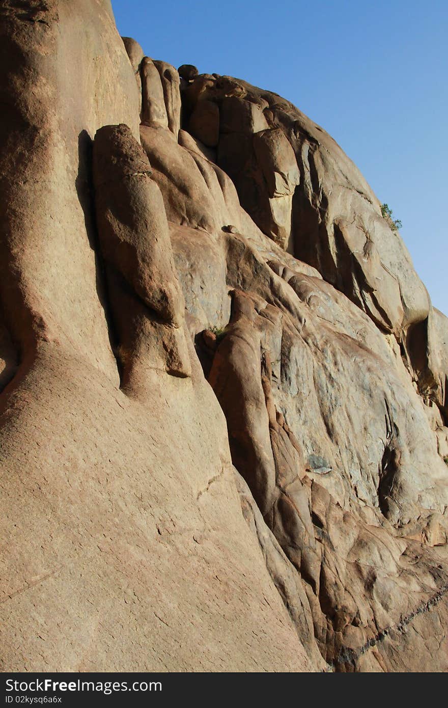 Rock in mountaines with clear blue sky