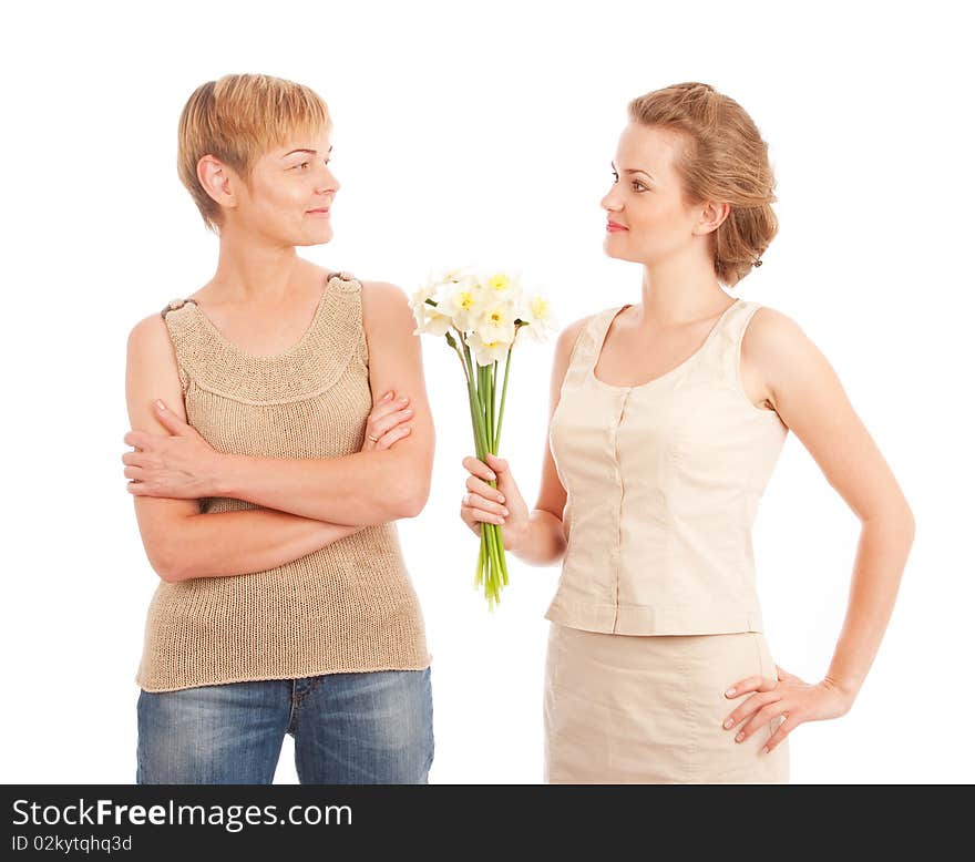 Mother and daughter with flowers isolated on white