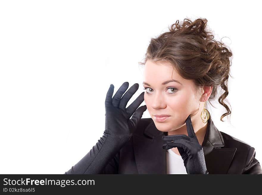 Brunet woman in black gloves. Make-up, hairstyle. Isolated.