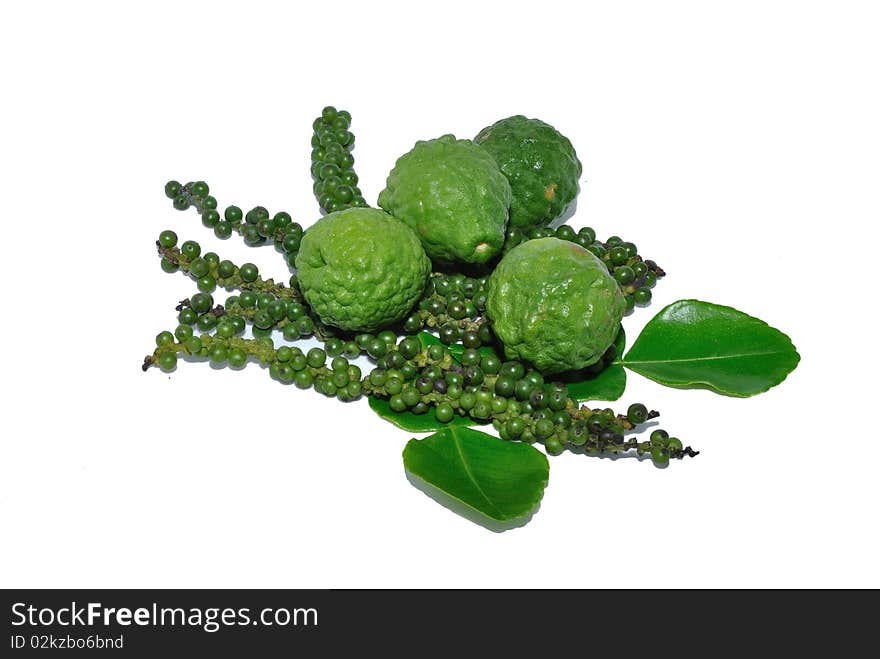 Pepper and kaffir lime isolated on white background.