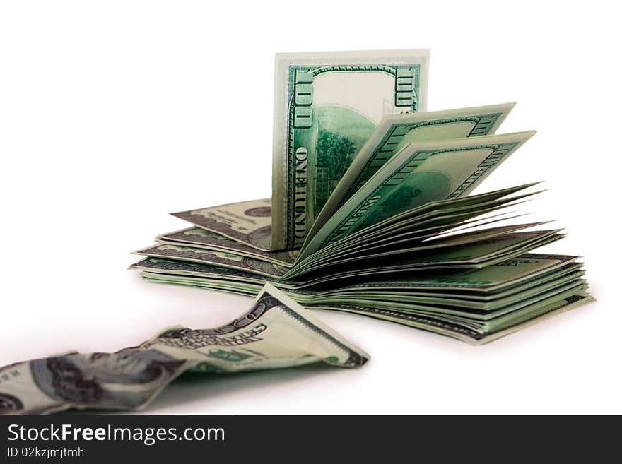 A pile of hundred-dollar bills and the old bill isolated on a white background