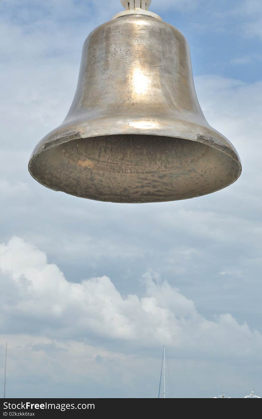 The old bell in the background of the sky. The old bell in the background of the sky